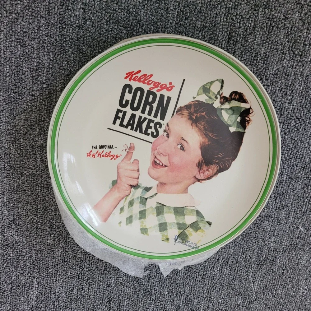 Collectible Norman Rockwell Kellogg's corn flakes set of 4 plates retro american